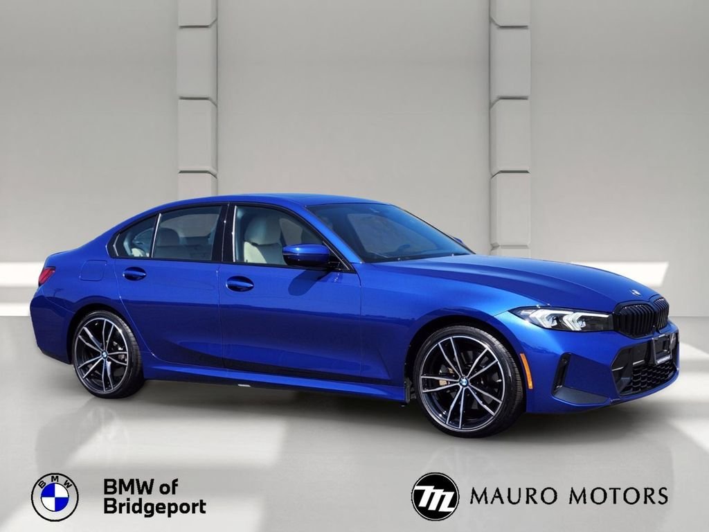 Used 2023 Blue BMW 330i xDrive image 1