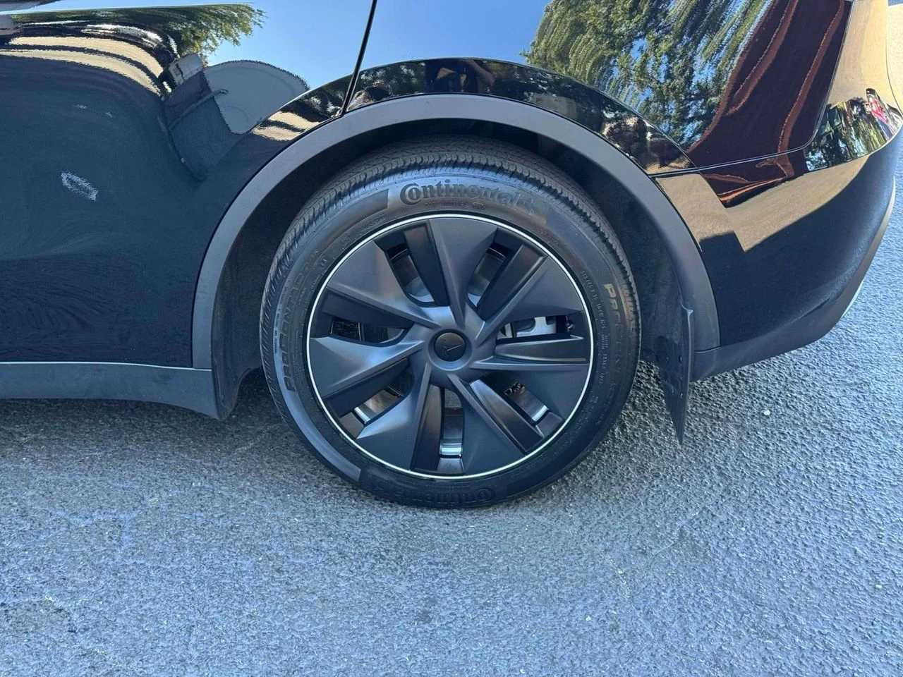 Used 2023 Solid Black Tesla Long Range Dual Motor All-Wheel Drive image 11