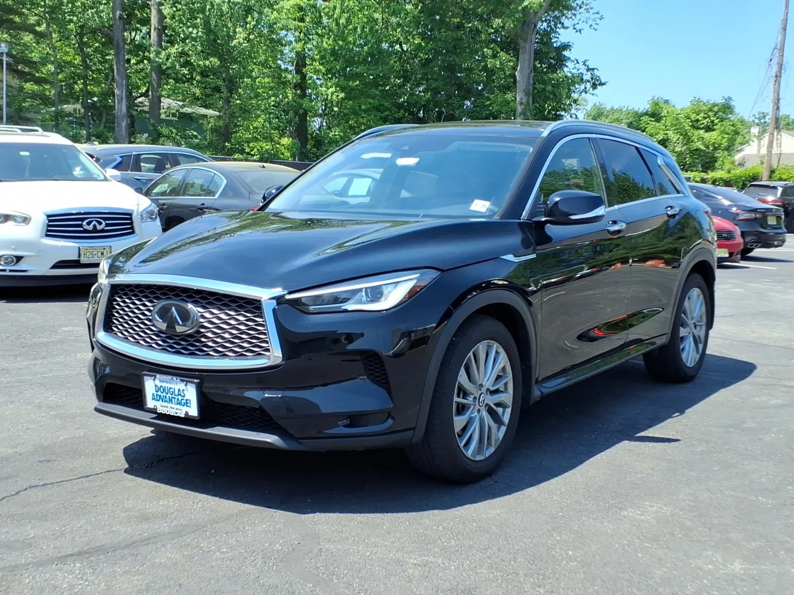 Certified Used 2024 Black INFINITI LUXE image 1