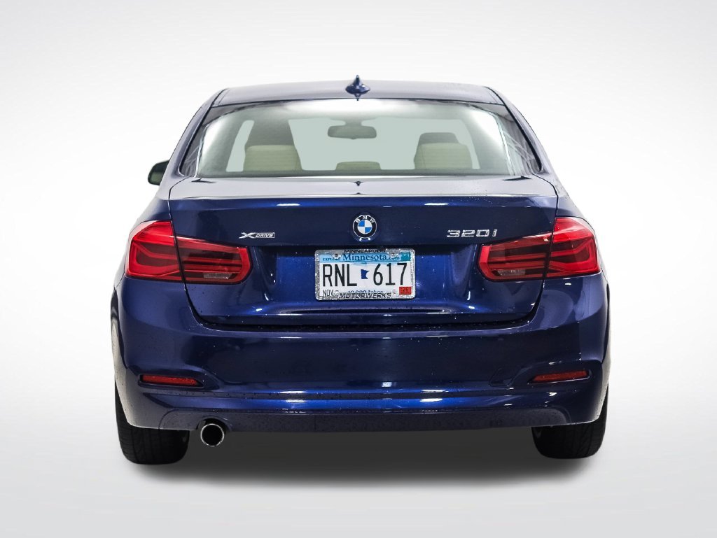 Used 2018 Blue Metallic BMW 320i xDrive image 4