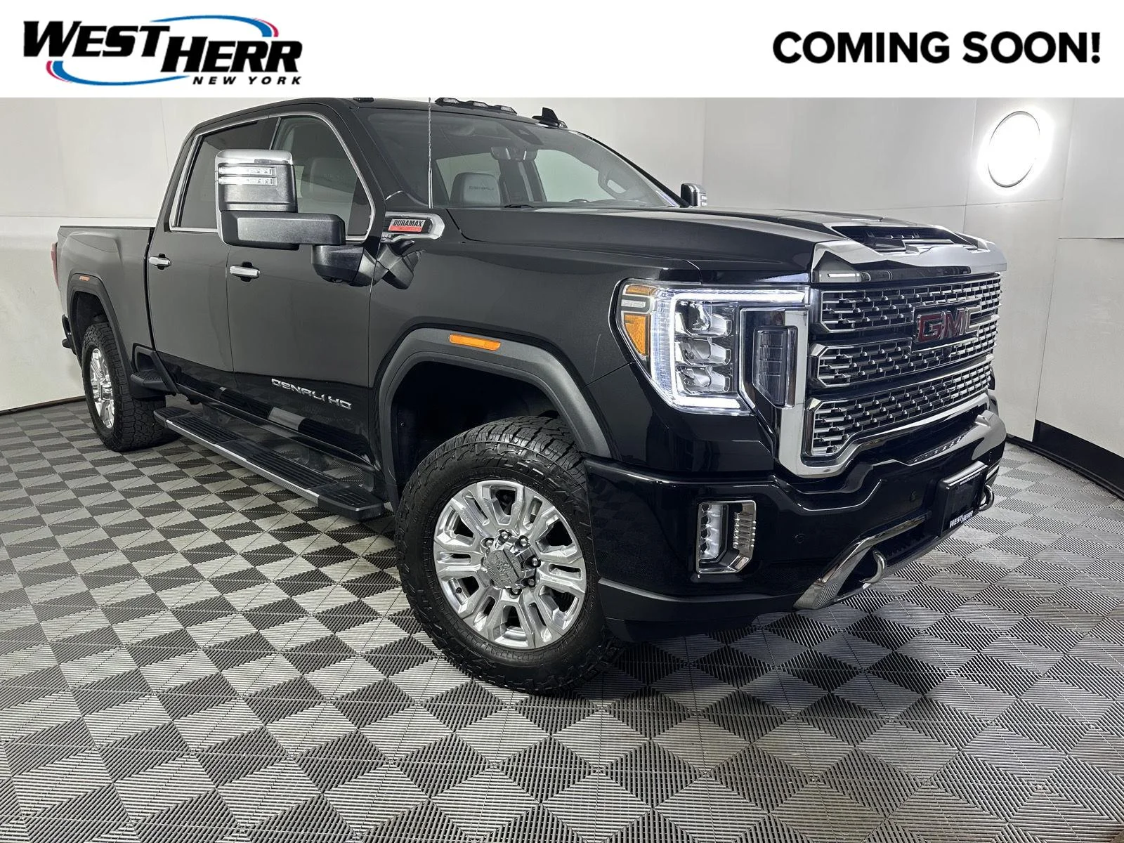 Used 2023 Ebony Twilight Metallic GMC Denali image 1