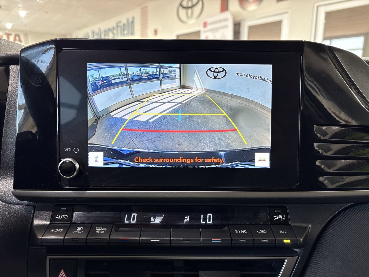 Certified Used 2025 Midnight Black Metallic Toyota LE image 18