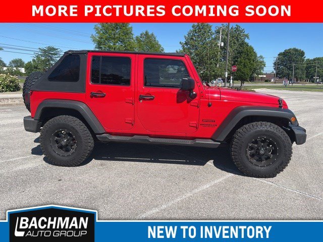 Used 2017 Firecracker Red Clearcoat Jeep Sport image 6