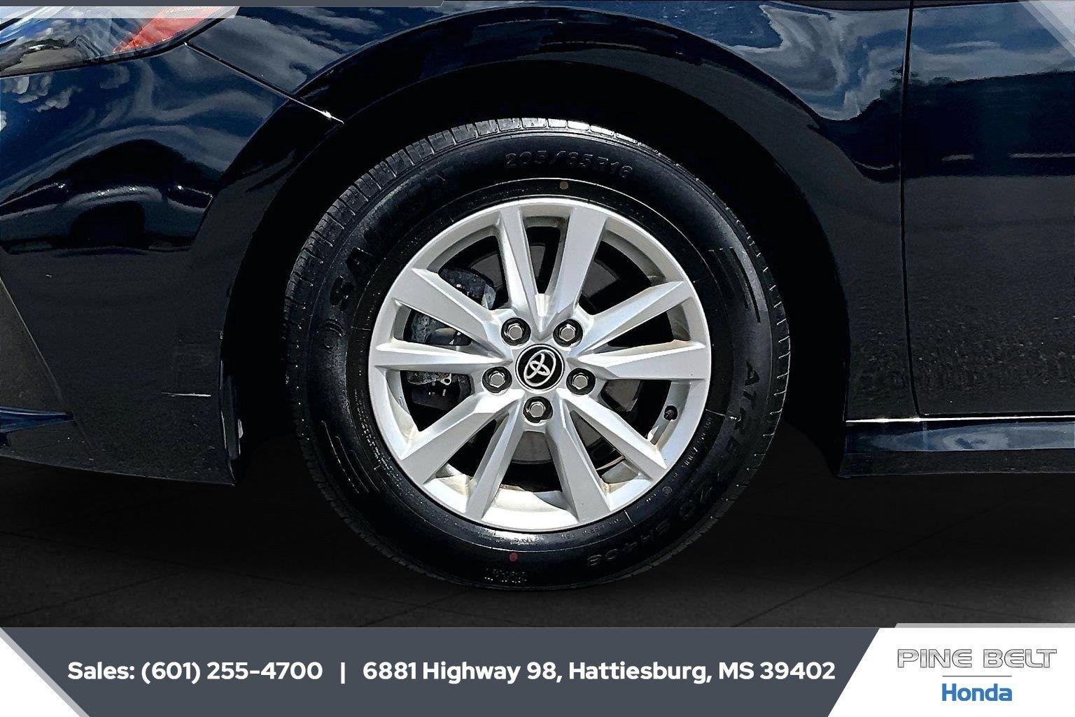 Used 2025 Midnight Black Metallic Toyota LE image 7