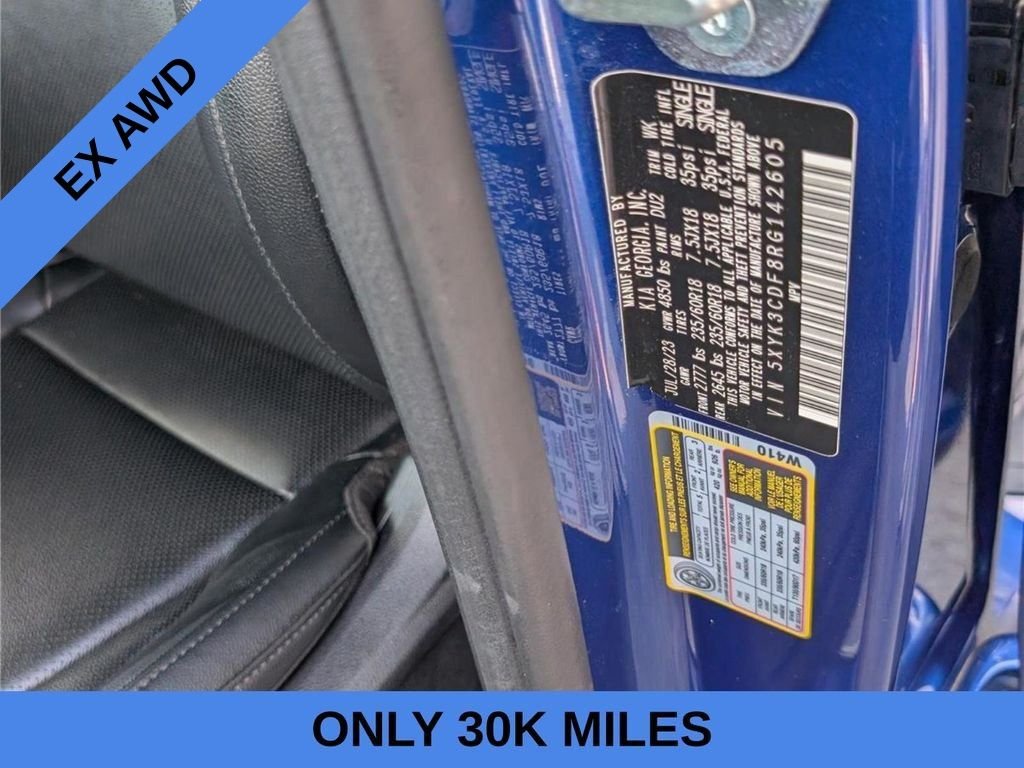 Used 2024 Blue Kia EX image 13