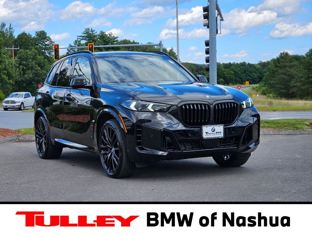 Used 2026 Black Sapphire Metallic BMW xDrive40i image 1