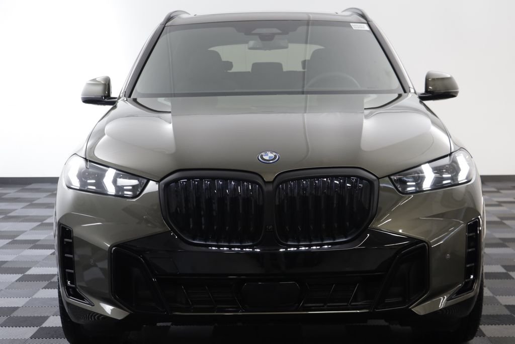 New 2026 Manhattan Green Metallic BMW xDrive50e image 24