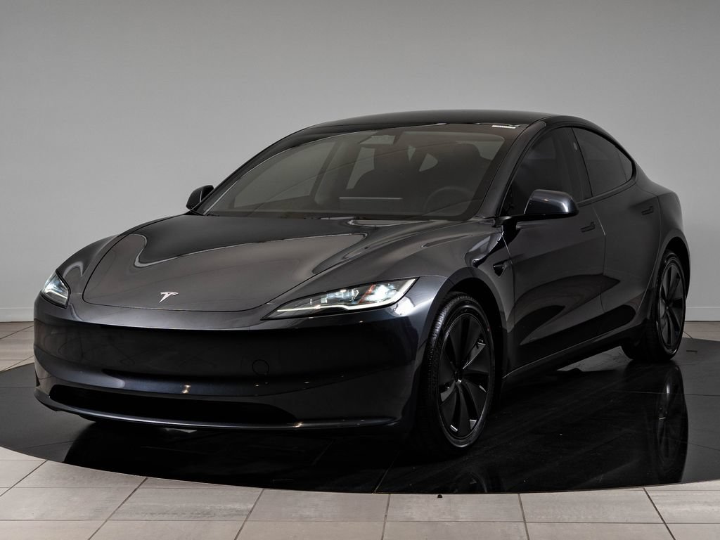 Used 2024 Stealth Gray Tesla  image 1