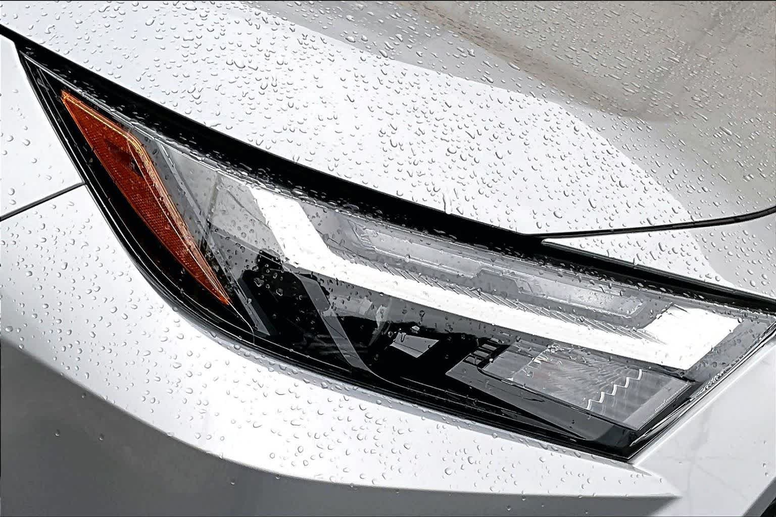 Used 2025 Silver Sky Metallic Toyota Hybrid XLE image 28