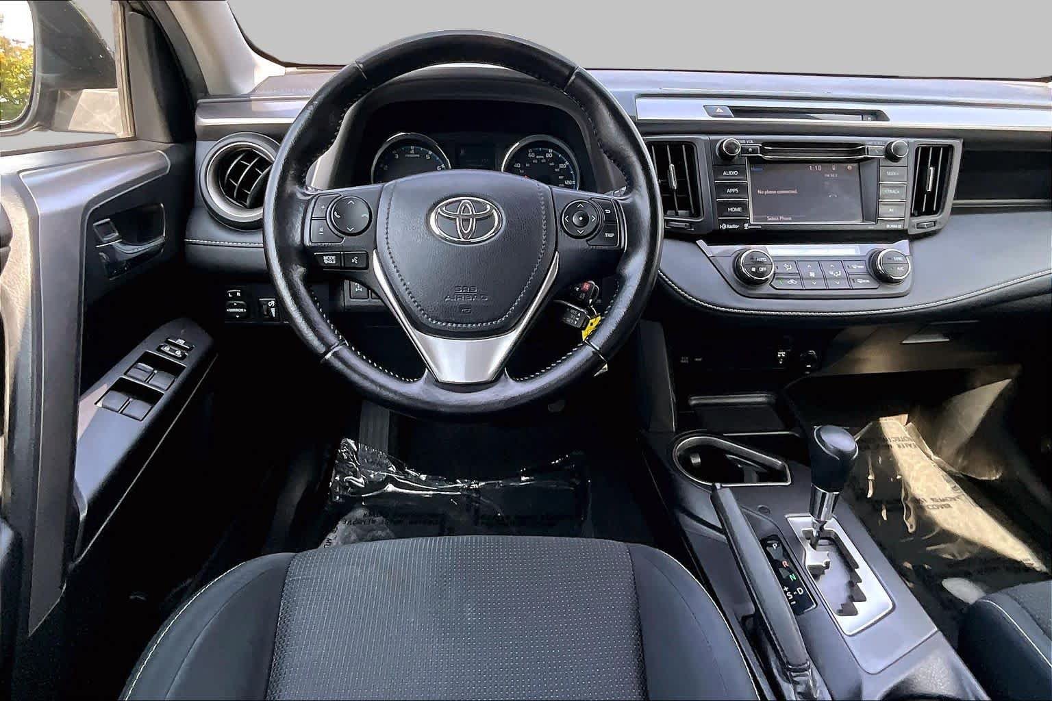 Used 2016 Magnetic Gray Metallic Toyota XLE image 6