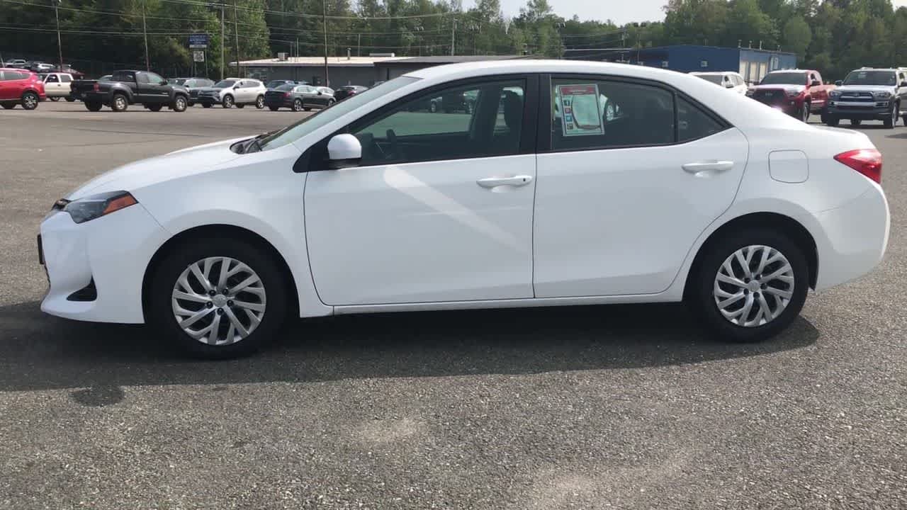 Used 2018 Super White Toyota LE image 5