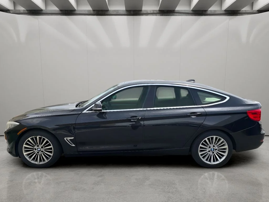 Used 2015 Black Sapphire Metallic BMW 328i xDrive image 3
