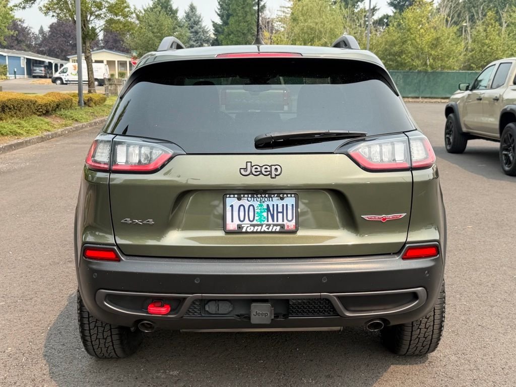 Used 2021 Olive Green Pearlcoat Jeep Trailhawk image 7