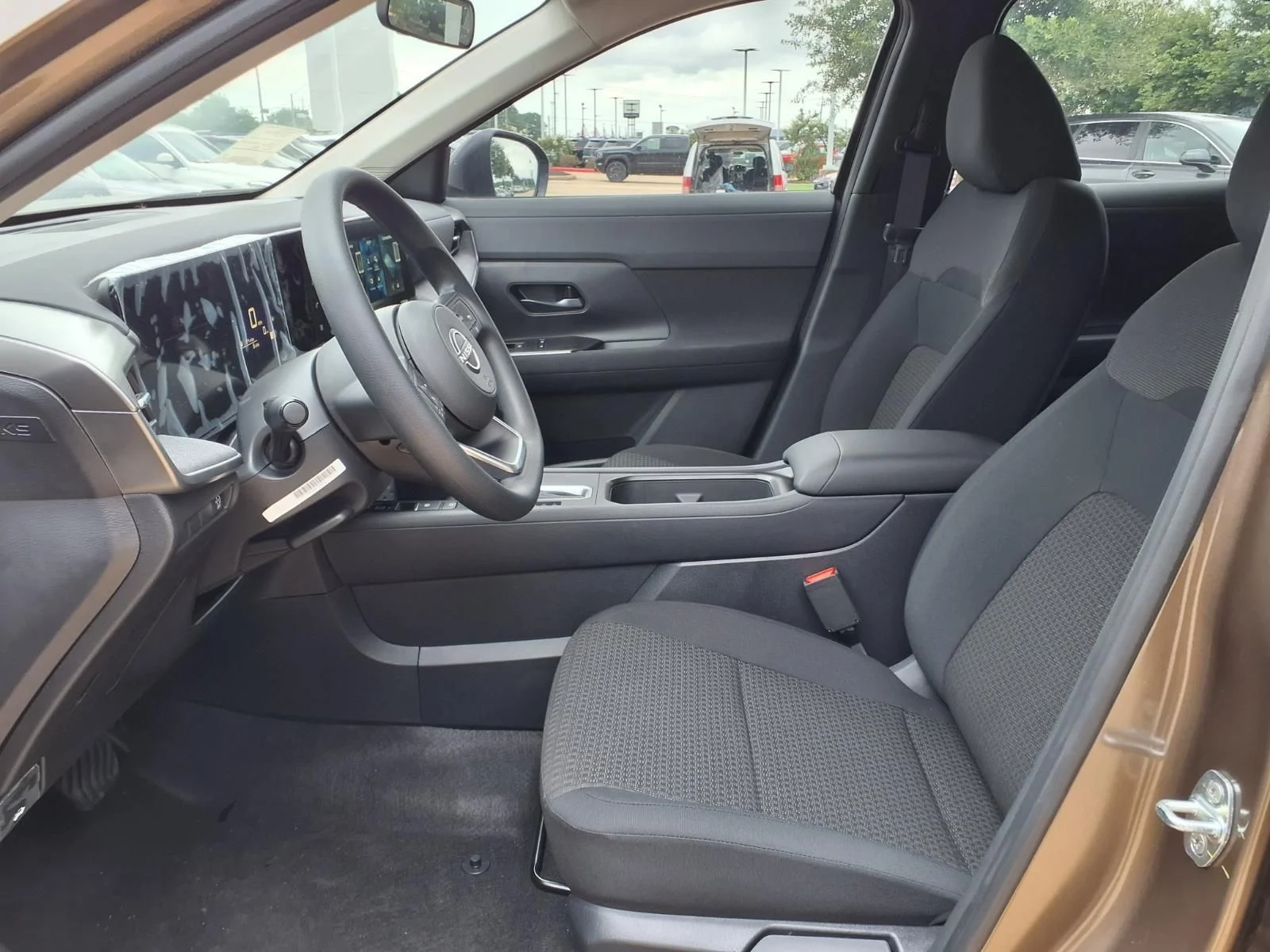 New 2026 Canyon Bronze Metallic Nissan S image 8