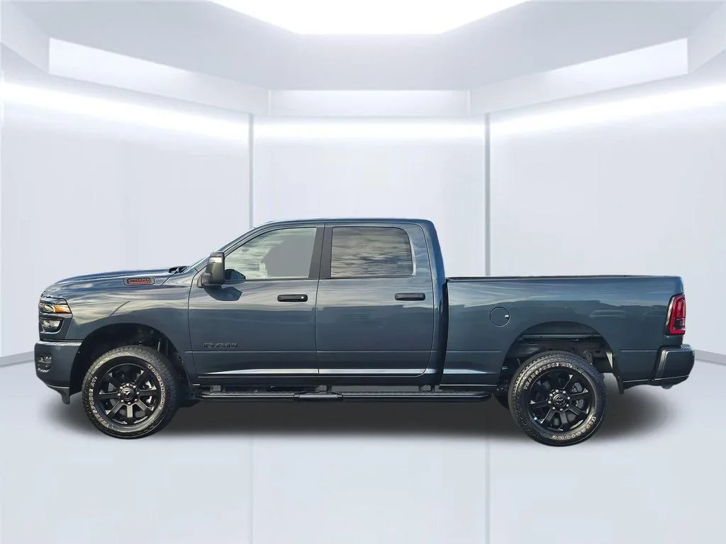 Used 2025 Blue Metallic Ram Big Horn image 20
