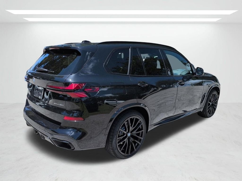 New 2026 Black Sapphire Metallic BMW xDrive40i image 4