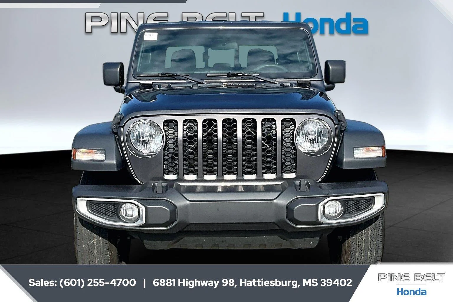 Used 2023 Granite Crystal Metallic Clearcoat Jeep Sport image 3