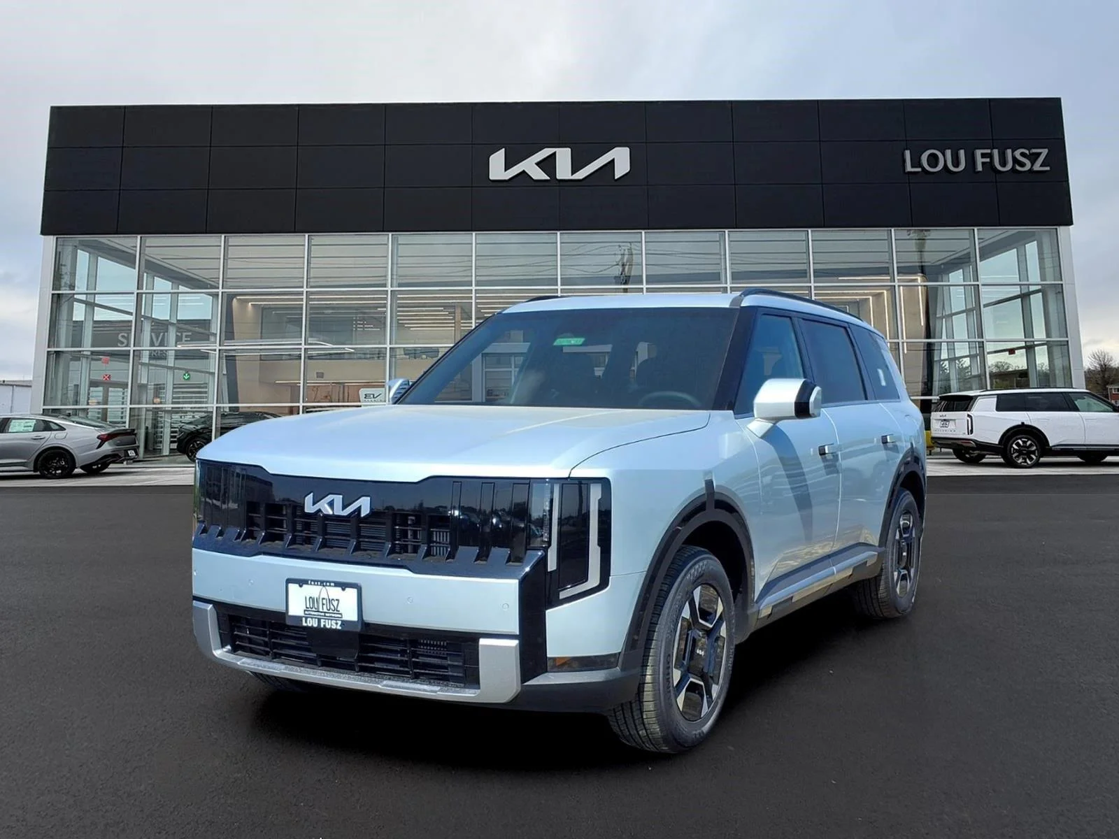 New 2027 Ivory Silver KIA EX AWD image 1