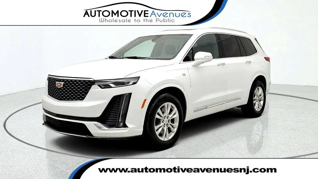 Used 2024 Midnight Sky Metallic Cadillac Luxury FWD w/ UltraView Panoramic Roof image 1