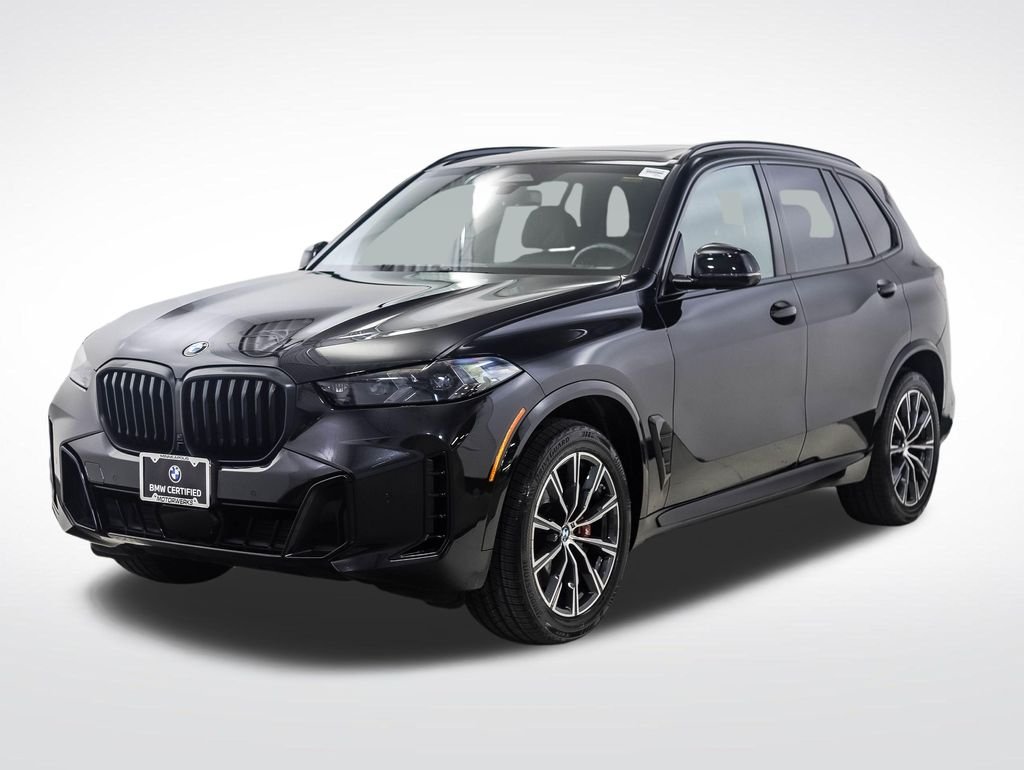 Certified Used 2024 Black Sapphire Metallic BMW xDrive40i image 1