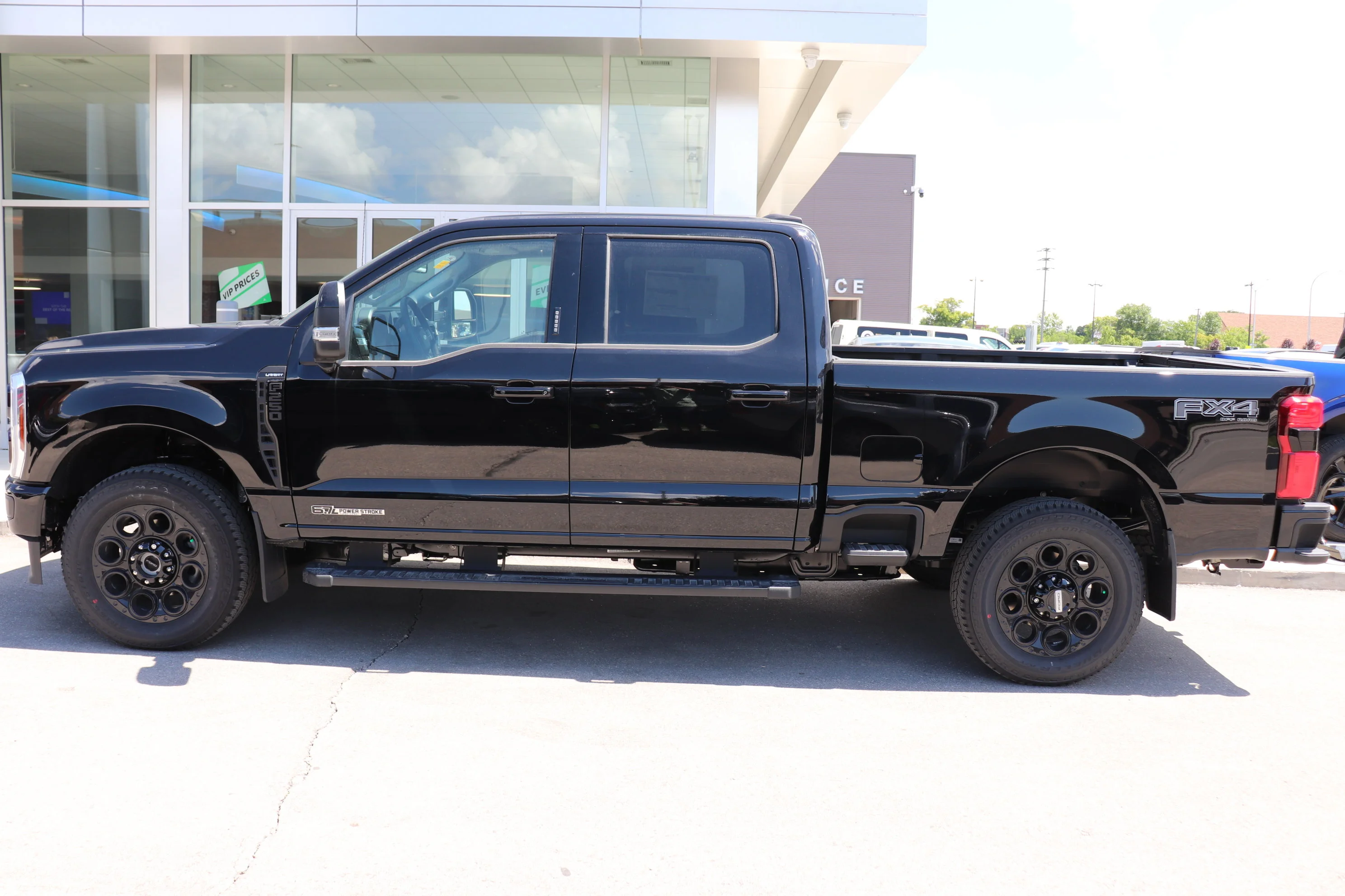 New 2026 AGATE BLACK METALLIC Ford LARIAT image 3