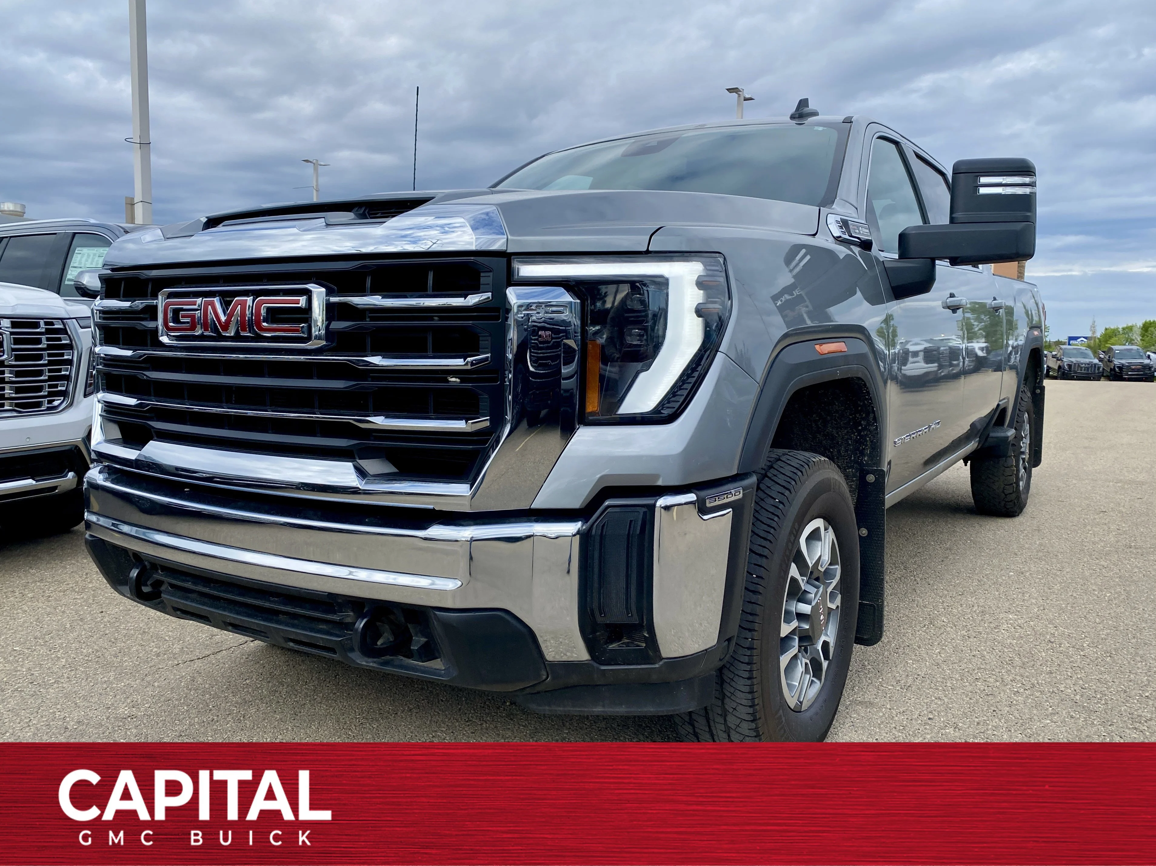 Certified Used 2024 Silver GMC Crew Cab SLE image 1