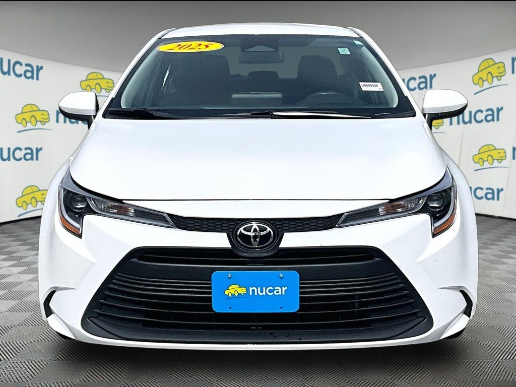 Used 2025 White Toyota LE image 2