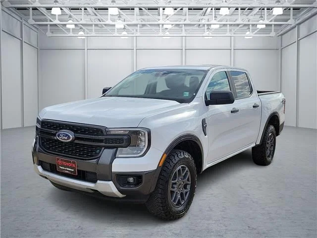 Used 2024 Oxford White Ford XLT 4x4 SuperCrew 5 ft. box 128.7 in. WB image 1