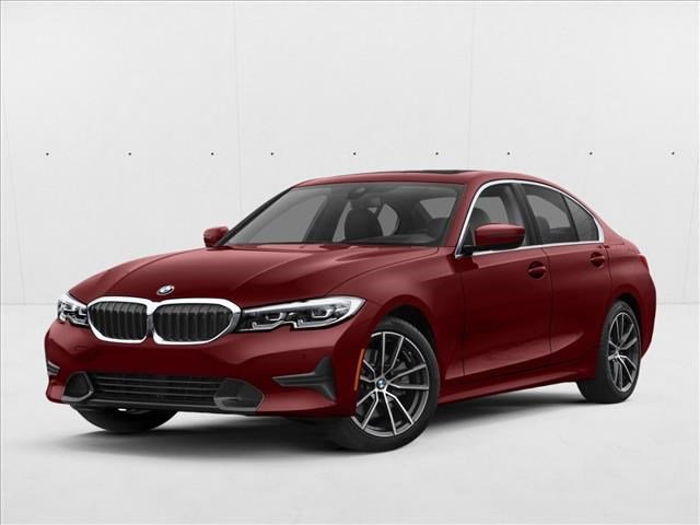 Used 2021 Black Sapphire Met BMW 330i xDrive image 1