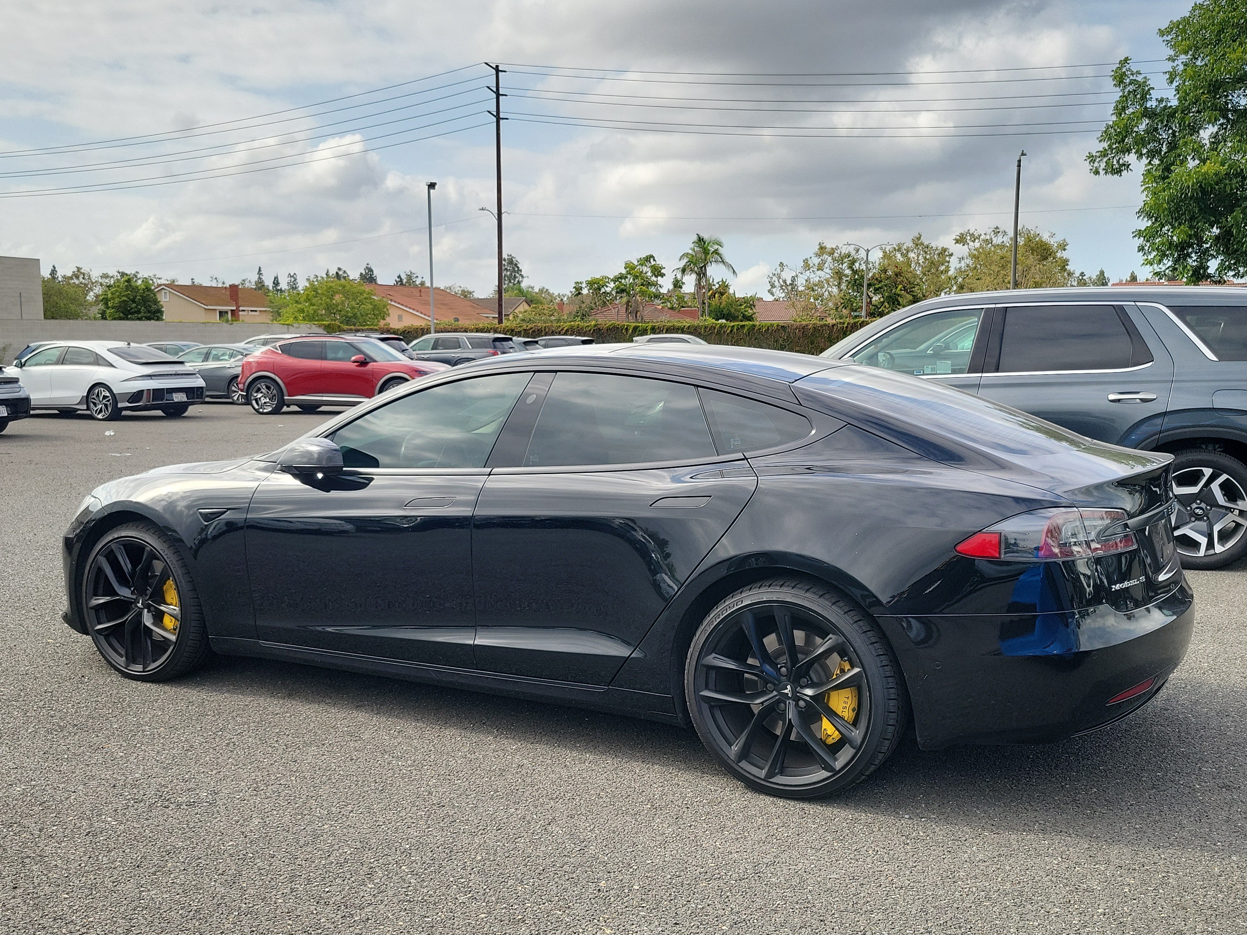 Used 2018 Solid Black Tesla 75D image 3