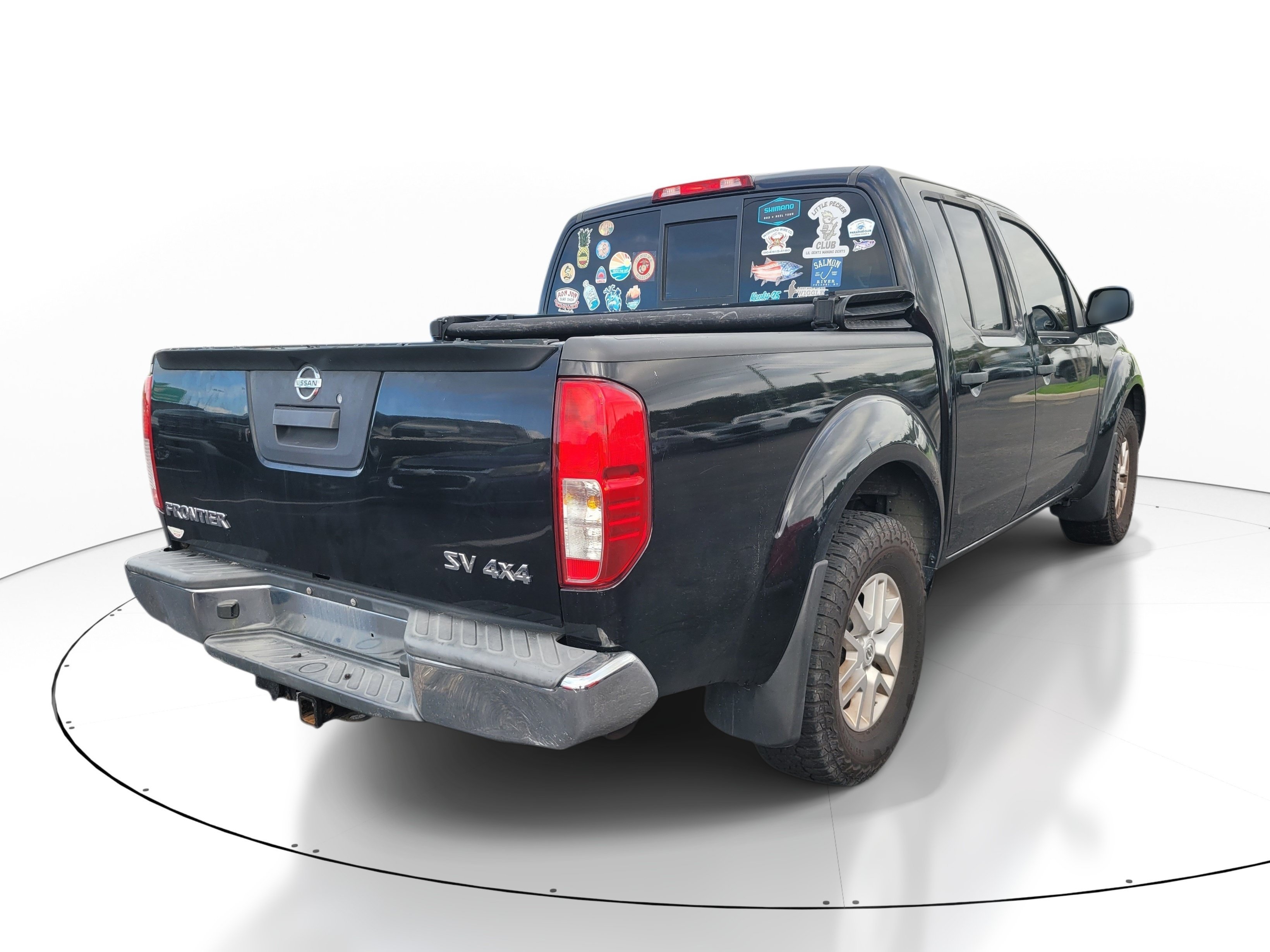Used 2016 Magnetic Black Nissan SV image 4