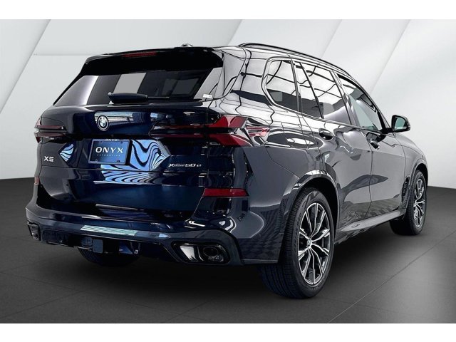 New 2026 Carbon Black Metallic BMW xDrive50e image 5