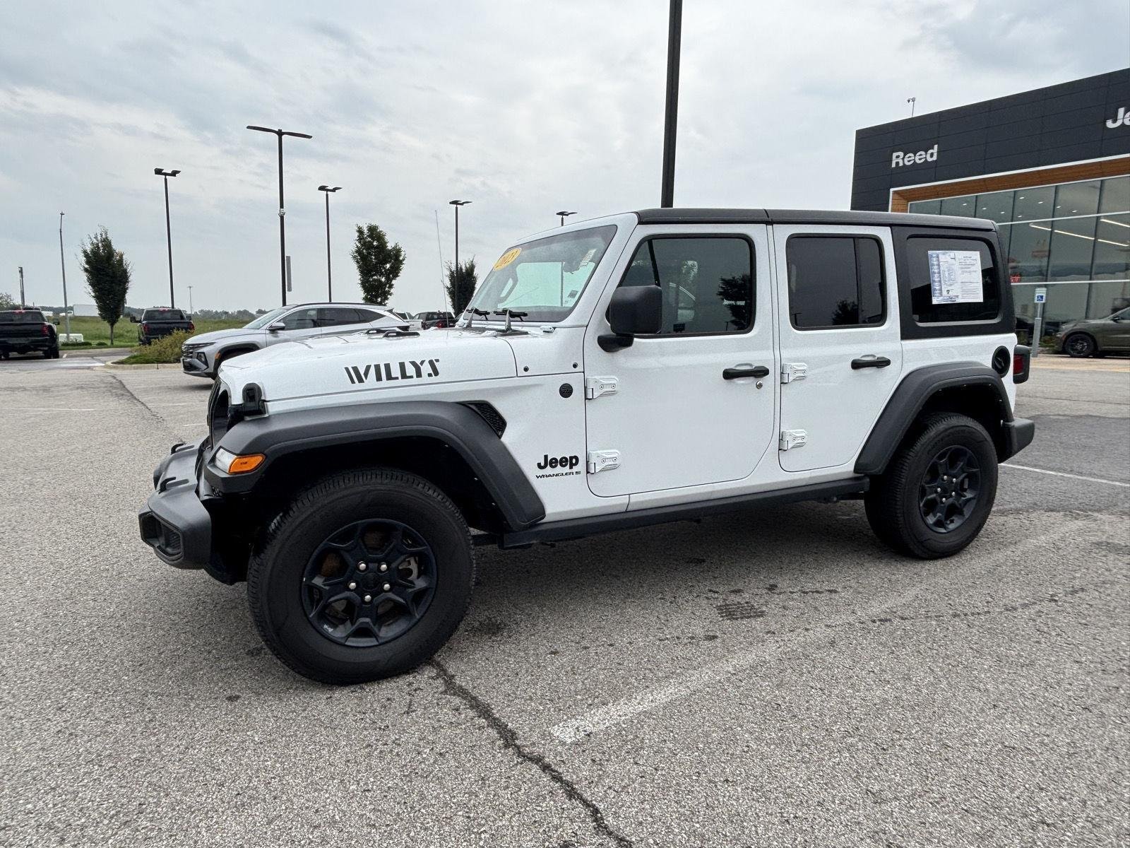 Used 2023 Jeep Wrangler 4-Door Willys with VIN 1C4HJXDN0PW695537 for sale in Kansas City