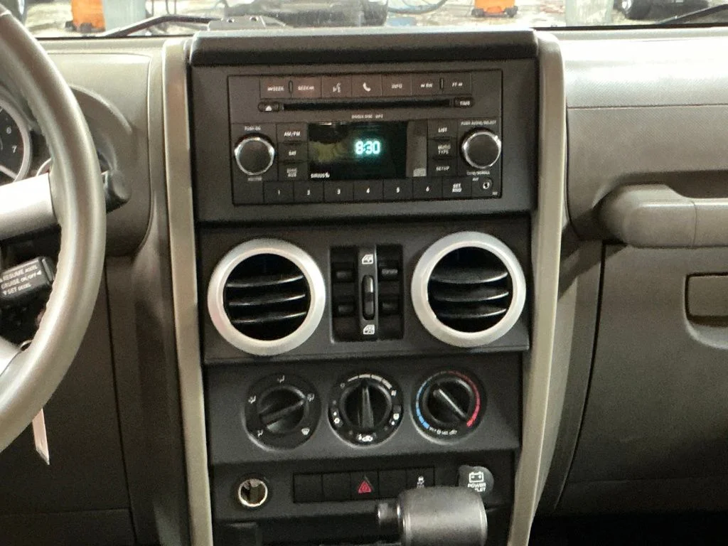 Used 2010 Red Jeep Unlimited Sahara image 17