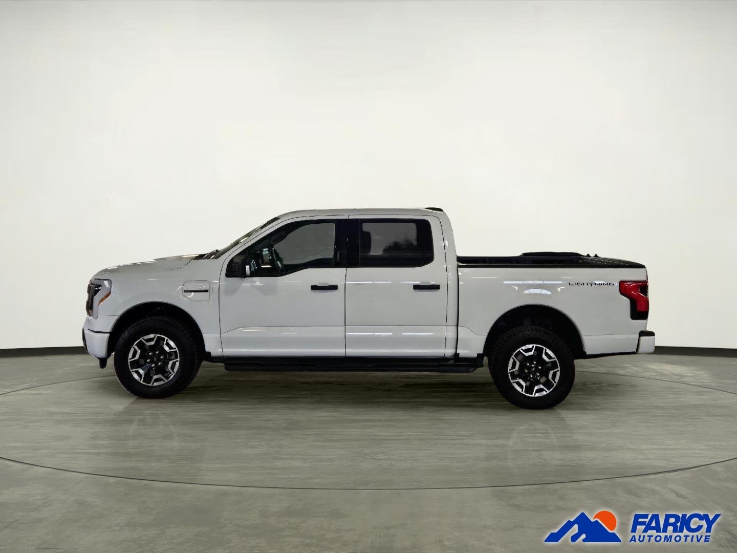 Used 2023 Ford F-150 Lightning XLT with VIN 1FTVW1EL9PWG37991 for sale in Canon City, CO
