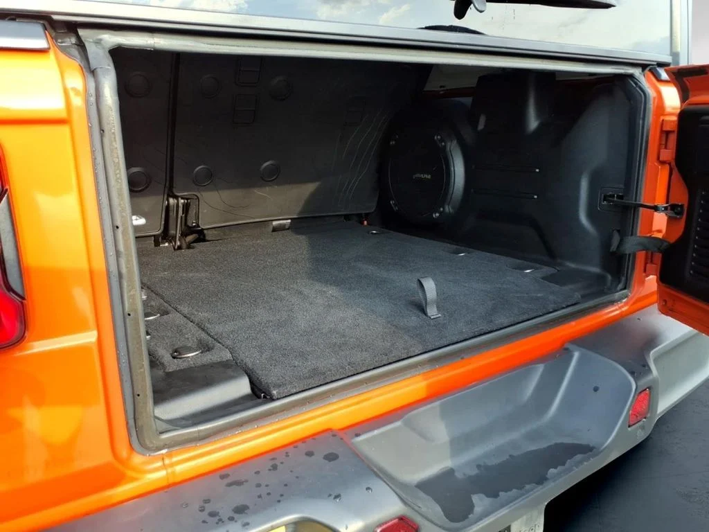 Used 2018 Orange Jeep Unlimited Sahara image 8