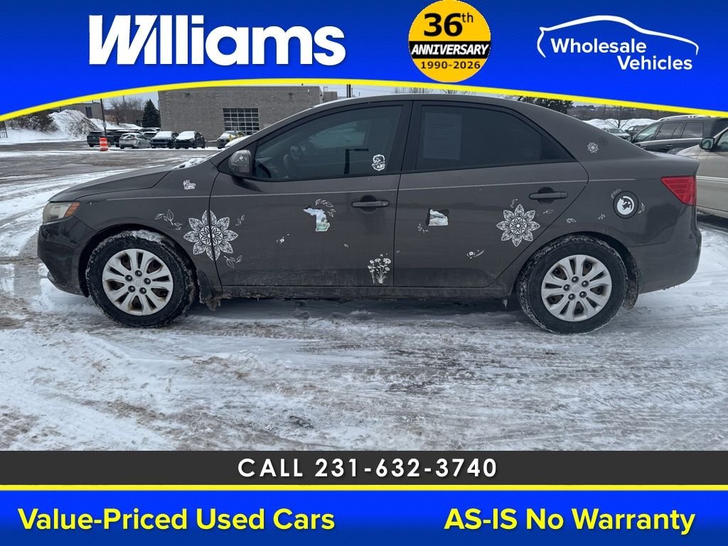 Used 2012 Kia Forte EX with VIN KNAFU4A21C5569594 for sale in Traverse City, MI