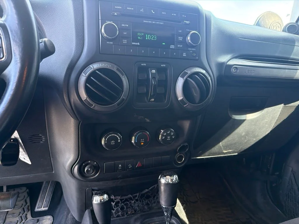 Used 2014 Black Clearcoat Jeep Unlimited Sport image 16