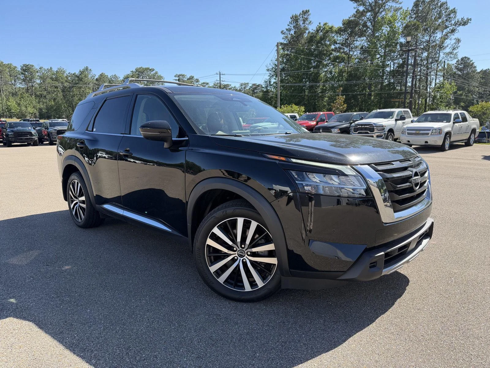 Used 2023 Super Black Nissan Platinum image 3