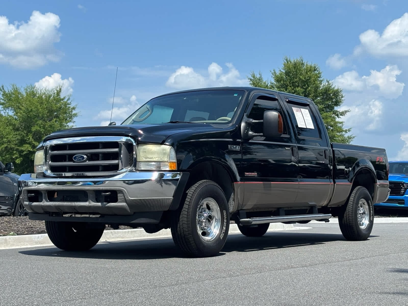 2004 Ford F-250 Lariat 4x4 Crew Cab SWB's photo
