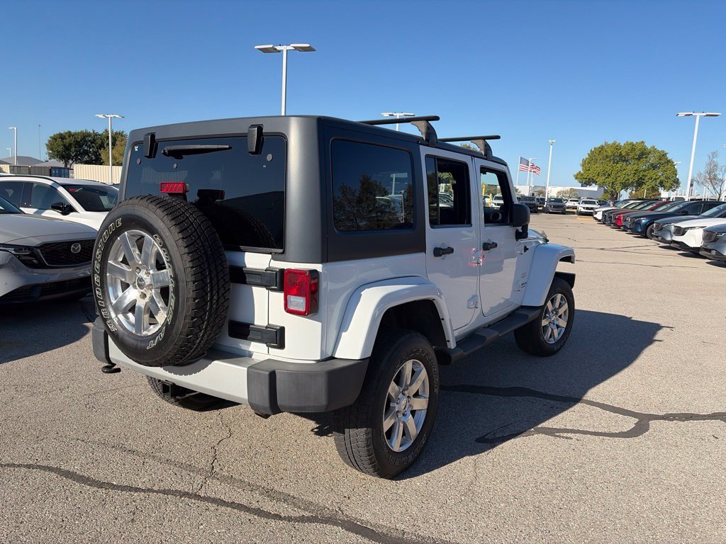 Used 2013 White Jeep Unlimited Sahara image 13