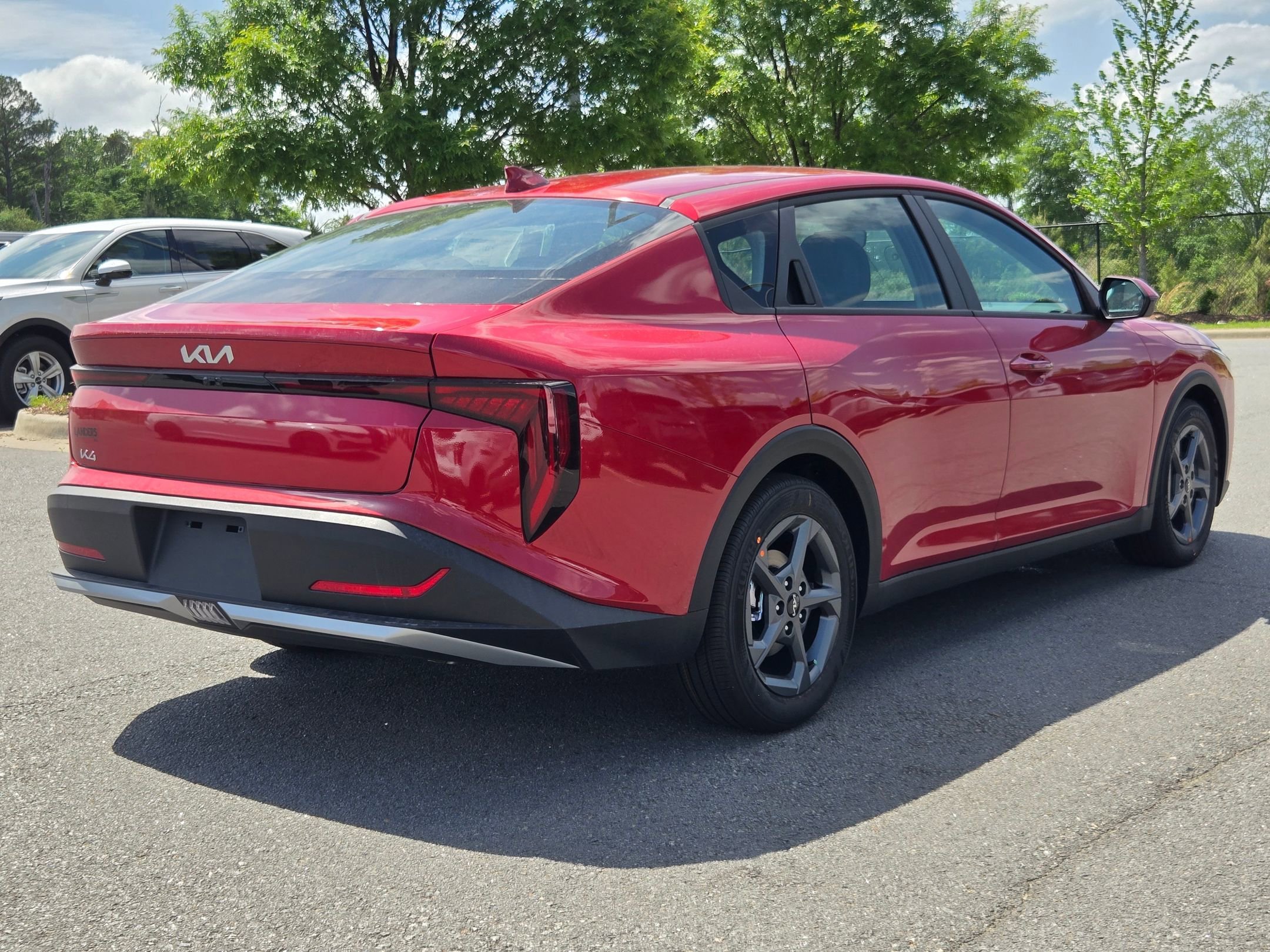 New 2026 Currant Red Kia LXS image 7