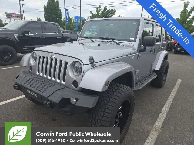 Used 2016 Billet Silver Metallic Clearcoat Jeep Unlimited Sahara image 1