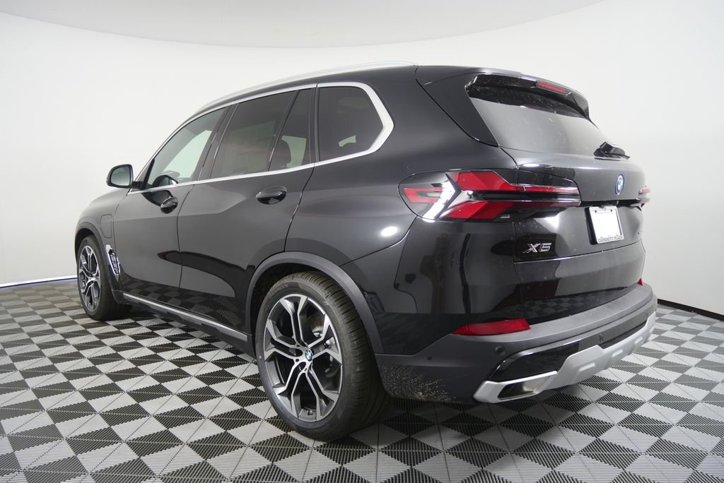 New 2026 Black Sapphire Metallic BMW xDrive50e image 6