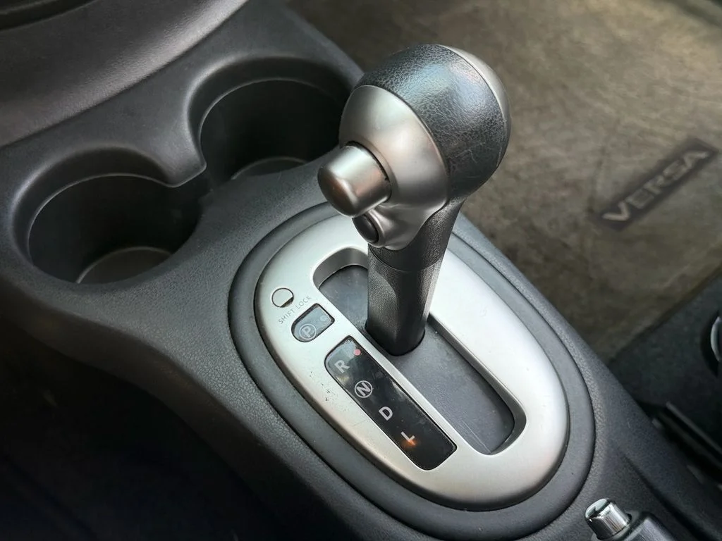 Used 2014 Metallic Peacock Nissan SV image 23
