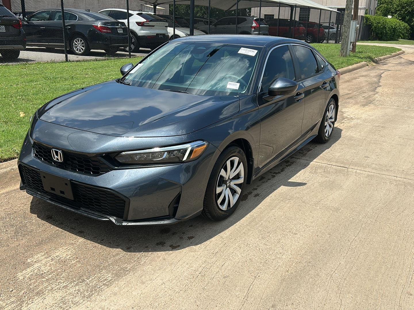 Used 2026 Meteorite Gray Metallic Honda LX CVT image 1