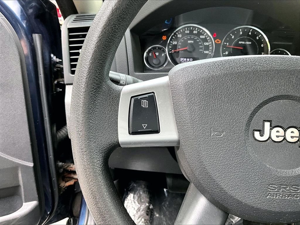 Used 2009 Modern Blue Pearlcoat Jeep Laredo image 22