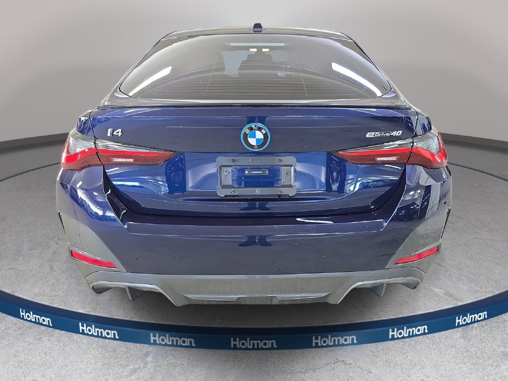 Used 2023 Tanzanite Blue II Metallic BMW eDrive40 image 8