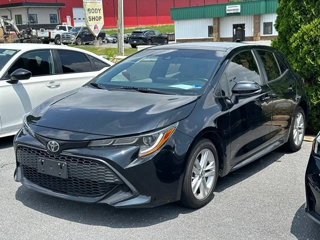 Used 2019 Midnight Black Metallic Toyota SE image 1