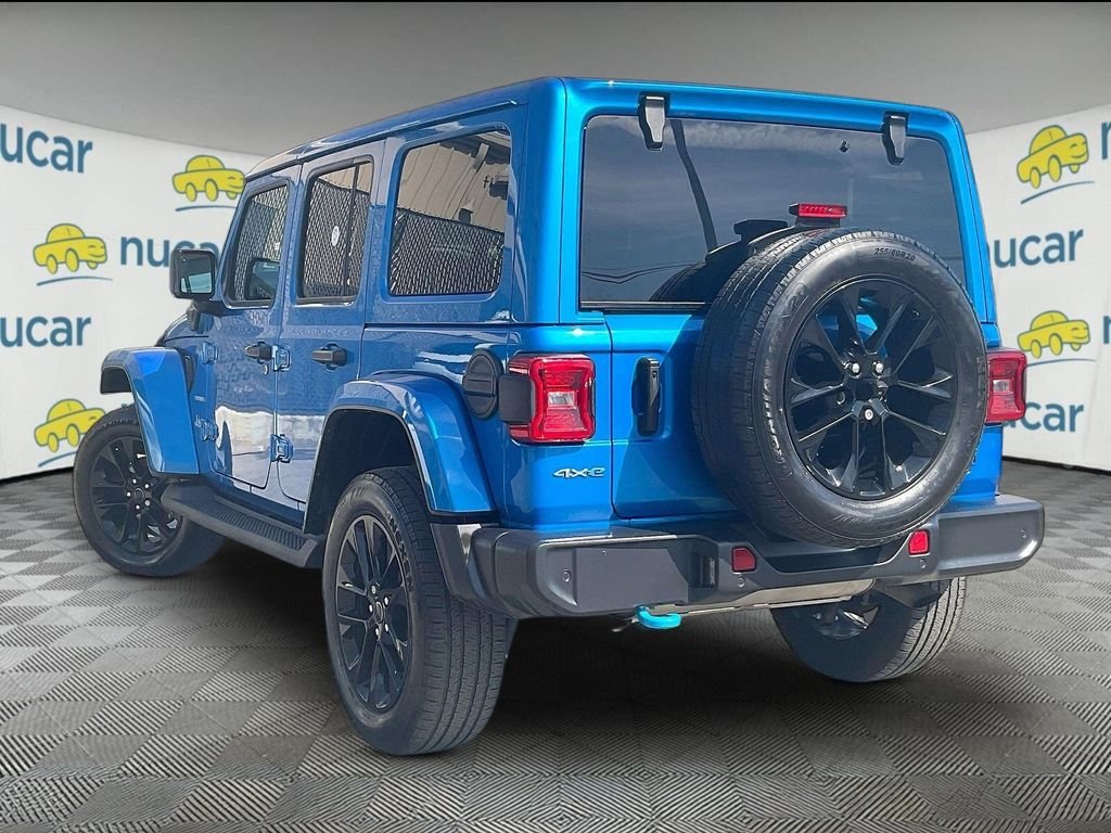 Used 2024 Blue Jeep Sahara 4xe image 4